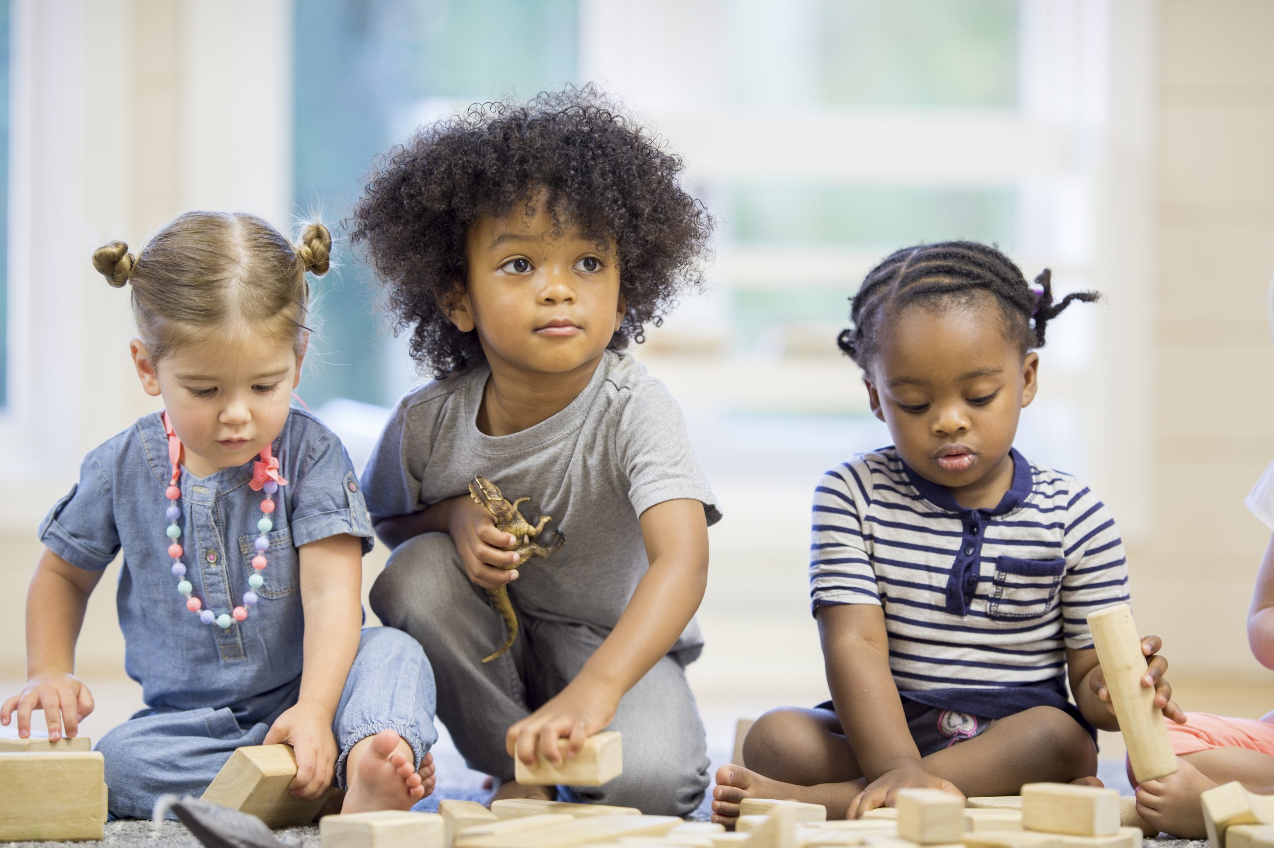 Preschoolers Playing with Blocks